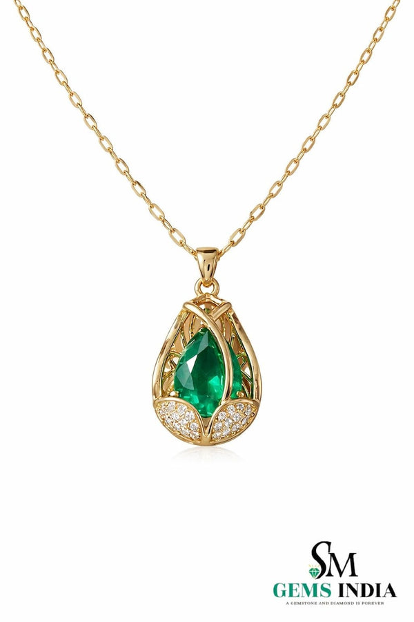 Natural pear shape emerald and diamond pendant