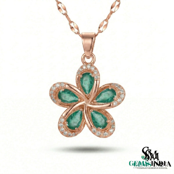 Pear Cut Emerald Flower Pendant with Diamond Halo in 18k Gold