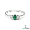 Fine 14K Gold Oval Emerald Ring with Two Round Diamonds
