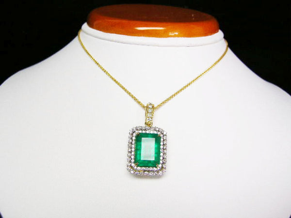 7.10 carat Glamorous Emerald and Diamond Halo Pendant Sparkling Double Diamond Halo