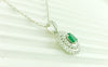 1 carat Vintage Style Oval Emerald Pendant with Diamond Halo in 14K Gold