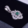 0.75 carat Round shaped Natural Emerald intertwined loops Cluster Pendant in 14k yellow gold