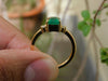 2.50 carat Elegant Emerald Cut Emerald Ring with Diamond Accents and 14k Gold Flat Band