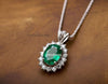 Vintage style 2.30 carat Oval shape Natural Emerald and Diamond Halo Pendant Necklace in 14K gold