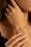 Elegant Oval Emerald Station Bracelet with Diamond Accents - Green Gemstone Jewelry