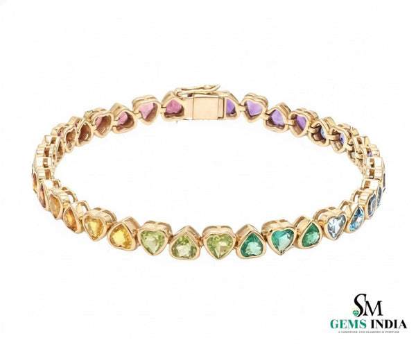 Doppelter Smaragd-Ring in offenem Design aus 14 Karat Gold – Band mit quadratisch und rund geschliffenen grünen Edelsteinen