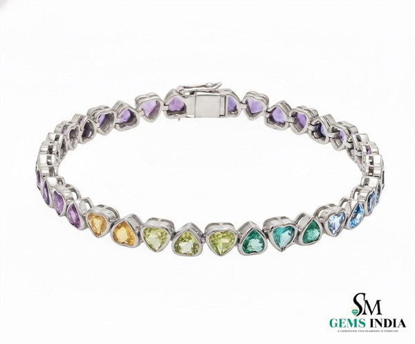 Doppelter Smaragd-Ring in offenem Design aus 14 Karat Gold – Band mit quadratisch und rund geschliffenen grünen Edelsteinen