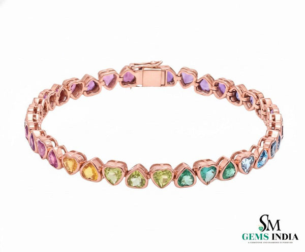 Doppelter Smaragd-Ring in offenem Design aus 14 Karat Gold – Band mit quadratisch und rund geschliffenen grünen Edelsteinen