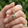 Round Emerald and Diamond Flower Pendant - Timeless Fine Jewelry