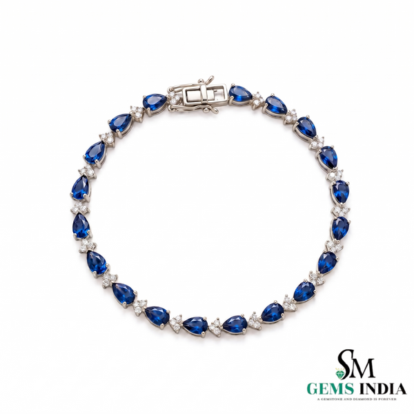 Pear-Cut Blue Sapphire Tennis Bracelet with Diamond Accents - September Birthstone Gift