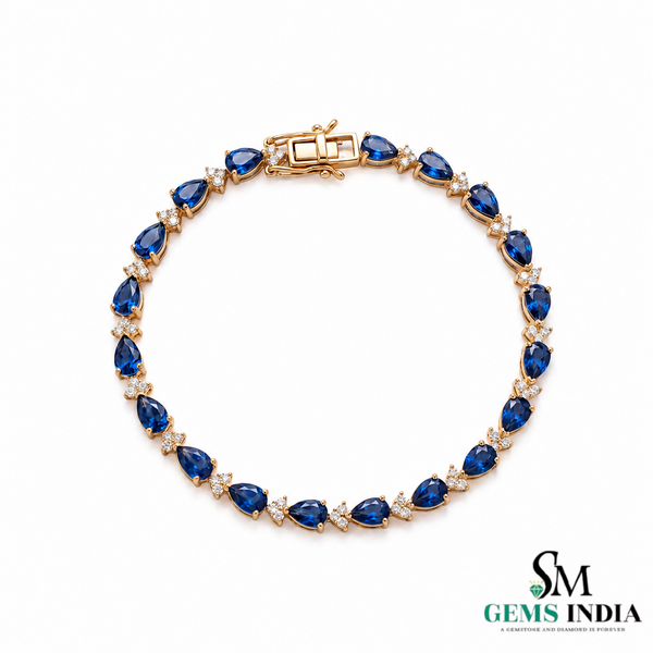 Pear-Cut Blue Sapphire Tennis Bracelet with Diamond Accents - September Birthstone Gift
