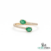 Elegant Oval Emerald and Diamond Bypass Ring - Green Gemstone Jewelry