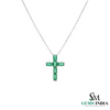 Gold necklace with a green gemstone cross pendant on a white background, branded 'SM Gems India'.