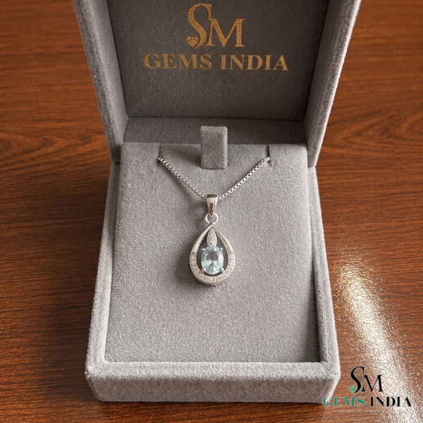 Natural Oval Cut Aquamarine Drop Pendant in a Diamond-Accented Tear Frame