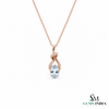Oval Cut Aquamarine and Diamond Accent Twisted Swirl Pendant