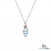 Oval Cut Aquamarine and Diamond Accent Twisted Swirl Pendant
