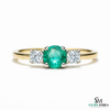 Minimalist Emerald Center Stone Ring with Diamond Accents