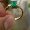 2.50 carat Elegant Emerald Cut Emerald Ring with Diamond Accents and 14k Gold Flat Band