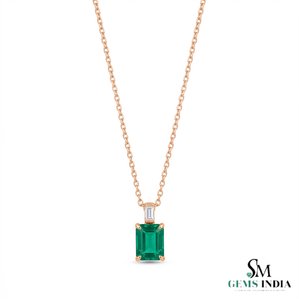 Elegant 1.03 carat Emerald cut Natural Emerald and Baguette Diamond Drop Pendant