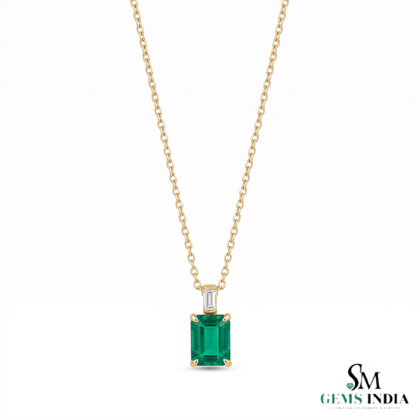 Elegant 1.03 carat Emerald cut Natural Emerald and Baguette Diamond Drop Pendant