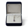 Natural Oval Tanzanite Twisted Diamond Pendant