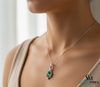 Natural Green Emerald Oval Pendant with Diamond Curve Design