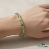 Elegant Emerald Cut Green Gemstone & Diamond Tennis Bracelet