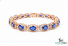 Classic Oval Blue Sapphire Bracelet with Diamond-Style Halo - Statement Jewelry