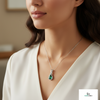 1.30 carat Infinity Teardrop Natural Emerald Pendant with Diamond Accents in 14K gold