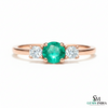 Minimalist Emerald Center Stone Ring with Diamond Accents