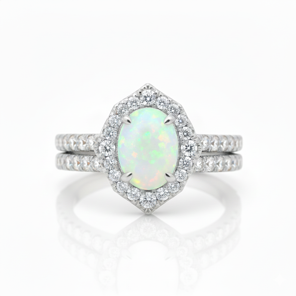 Doppelter Smaragd-Ring in offenem Design aus 14 Karat Gold – Band mit quadratisch und rund geschliffenen grünen Edelsteinen