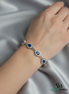 September Birthstone Blue Sapphire & Diamond Floral Bracelet – Elegant Fine Jewelry