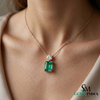 Emerald Cut Green Emerald Pendant with Round Diamond Accent