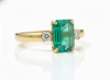 2.50 carat Elegant Emerald Cut Emerald Ring with Diamond Accents and 14k Gold Flat Band