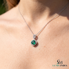 Round Emerald and Diamond Halo Pendant in 18K Gold May Birthstone Jewelry