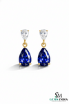 Pear Blue Moissanite Drop Earrings with White Moissanite Accents