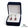 Pear Ruby Drop Earrings with Heart Moissanite & Diamond Accents in 18k Gold