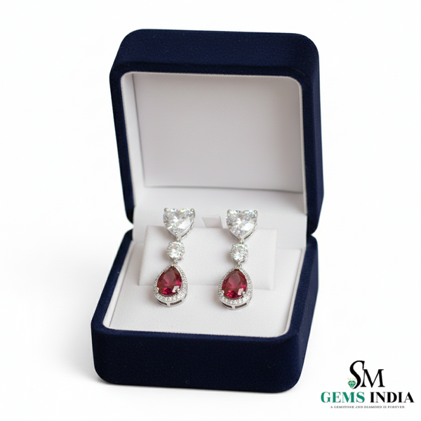 Pear Ruby Drop Earrings with Heart Moissanite & Diamond Accents in 18k Gold
