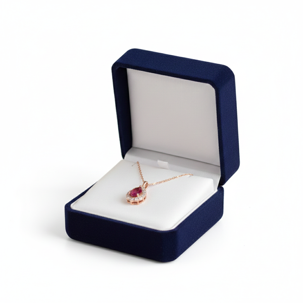 Pear Cut Natural Ruby and Diamond Halo Pendant in 14K gold