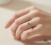 Minimalist Emerald Center Stone Diamond Accent Gold Ring