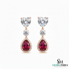 Pear Ruby Drop Earrings with Heart Moissanite & Diamond Accents in 18k Gold
