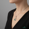 Emerald Teardrop Halo Pendant in 14k Gold emerald jewelry for women