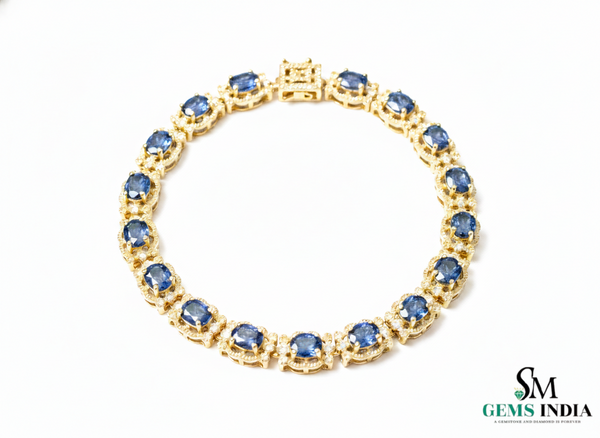 Tennisarmband aus Natur-Smaragden im Ovalschliff und Diamanten in Gold | Tennisarmband aus Natur-Smaragden und Diamanten in Gold | Tennisarmband mit großen Smaragden im Ovalschliff