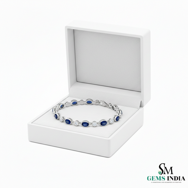 Tennisarmband aus Natur-Smaragden im Ovalschliff und Diamanten in Gold | Tennisarmband aus Natur-Smaragden und Diamanten in Gold | Tennisarmband mit großen Smaragden im Ovalschliff