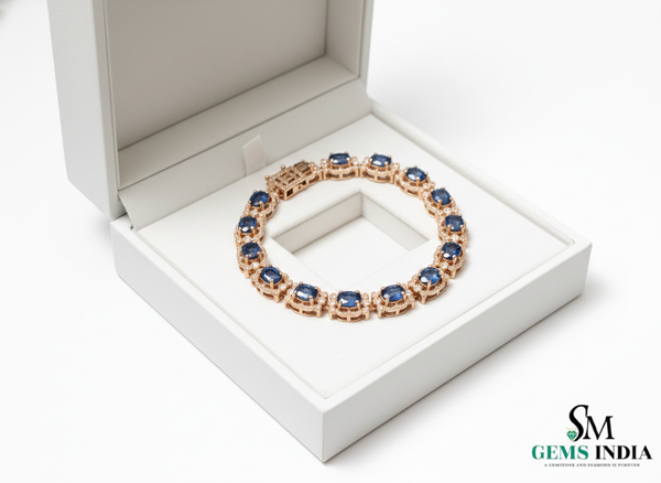 Tennisarmband aus Natur-Smaragden im Ovalschliff und Diamanten in Gold | Tennisarmband aus Natur-Smaragden und Diamanten in Gold | Tennisarmband mit großen Smaragden im Ovalschliff