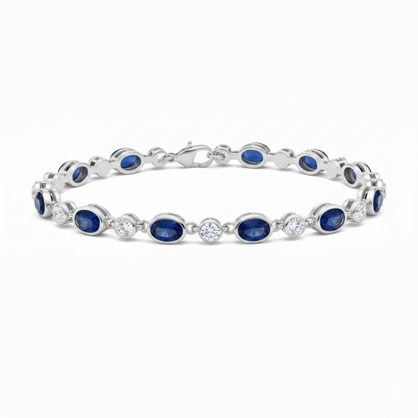 Tennisarmband aus Natur-Smaragden im Ovalschliff und Diamanten in Gold | Tennisarmband aus Natur-Smaragden und Diamanten in Gold | Tennisarmband mit großen Smaragden im Ovalschliff