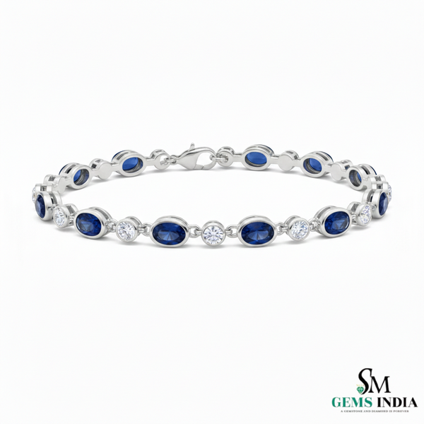 Tennisarmband aus Natur-Smaragden im Ovalschliff und Diamanten in Gold | Tennisarmband aus Natur-Smaragden und Diamanten in Gold | Tennisarmband mit großen Smaragden im Ovalschliff