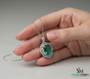 Emerald Cut Emerald Diamond Vintage Style Halo Pendant