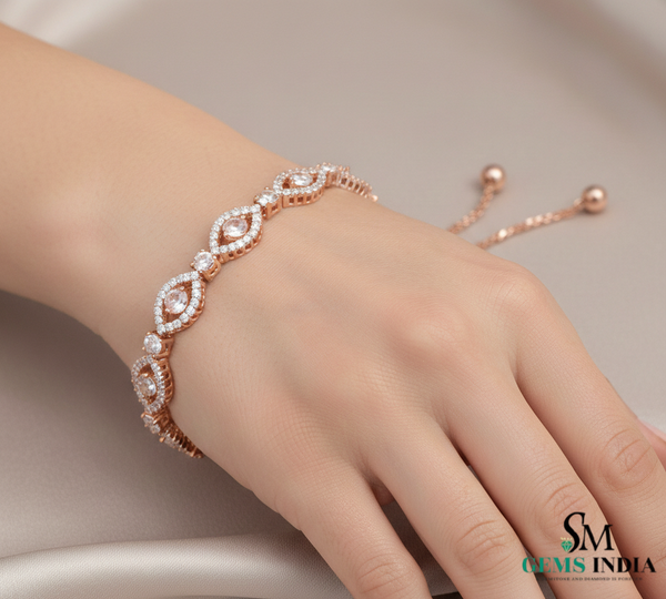 Tennisarmband aus Natur-Smaragden im Ovalschliff und Diamanten in Gold | Tennisarmband aus Natur-Smaragden und Diamanten in Gold | Tennisarmband mit großen Smaragden im Ovalschliff