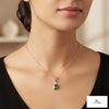 Elegant 1.03 carat Emerald cut Natural Emerald and Baguette Diamond Drop Pendant